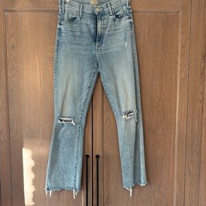 Distressed bootcut blue jeans